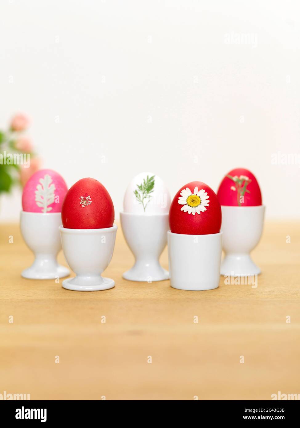 Easter eggs in egg cups, Munich, Bavaria, Germany Stock Photo