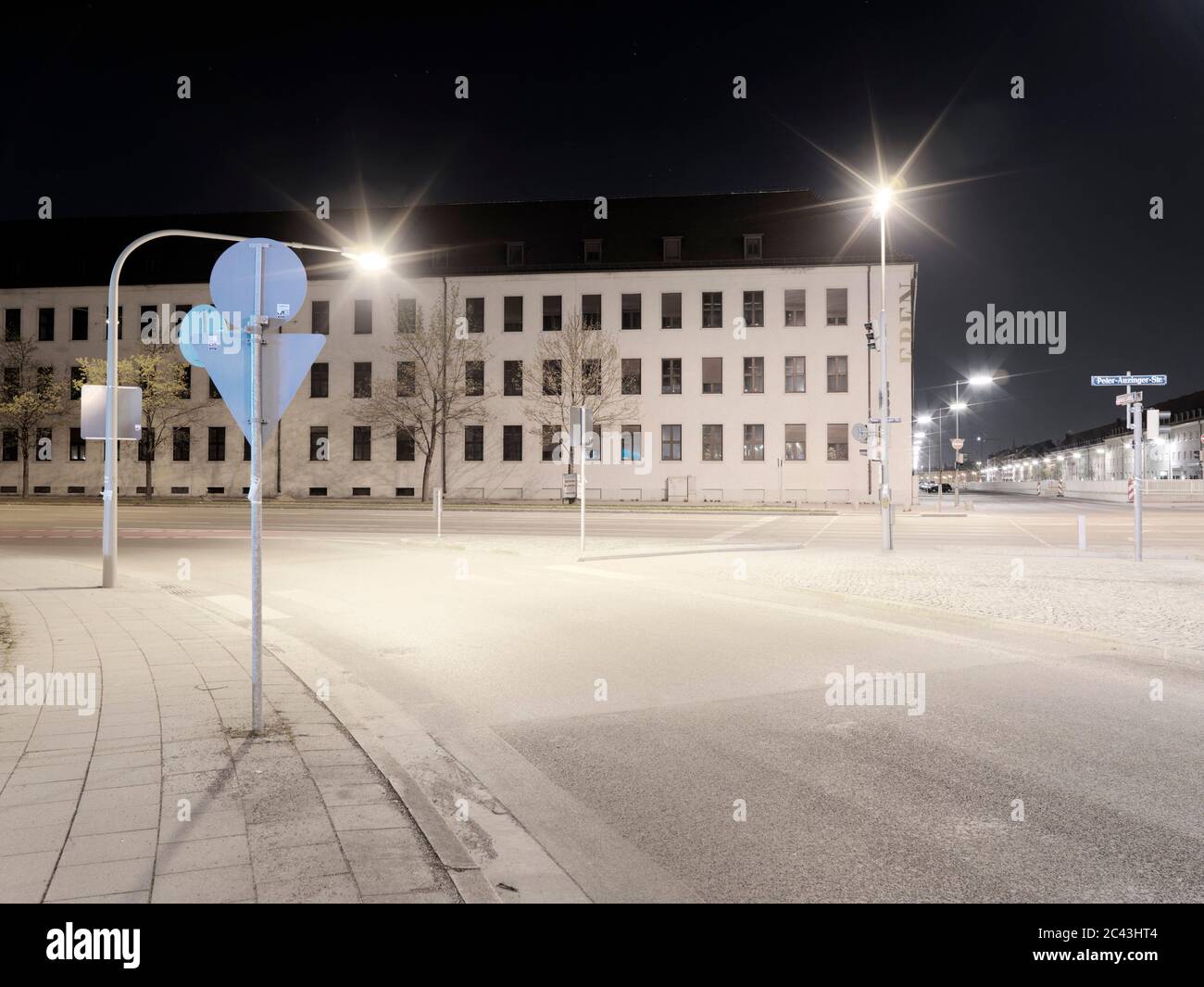Illuminated street at night, Munich, Bavaria, Germany Stock Photo