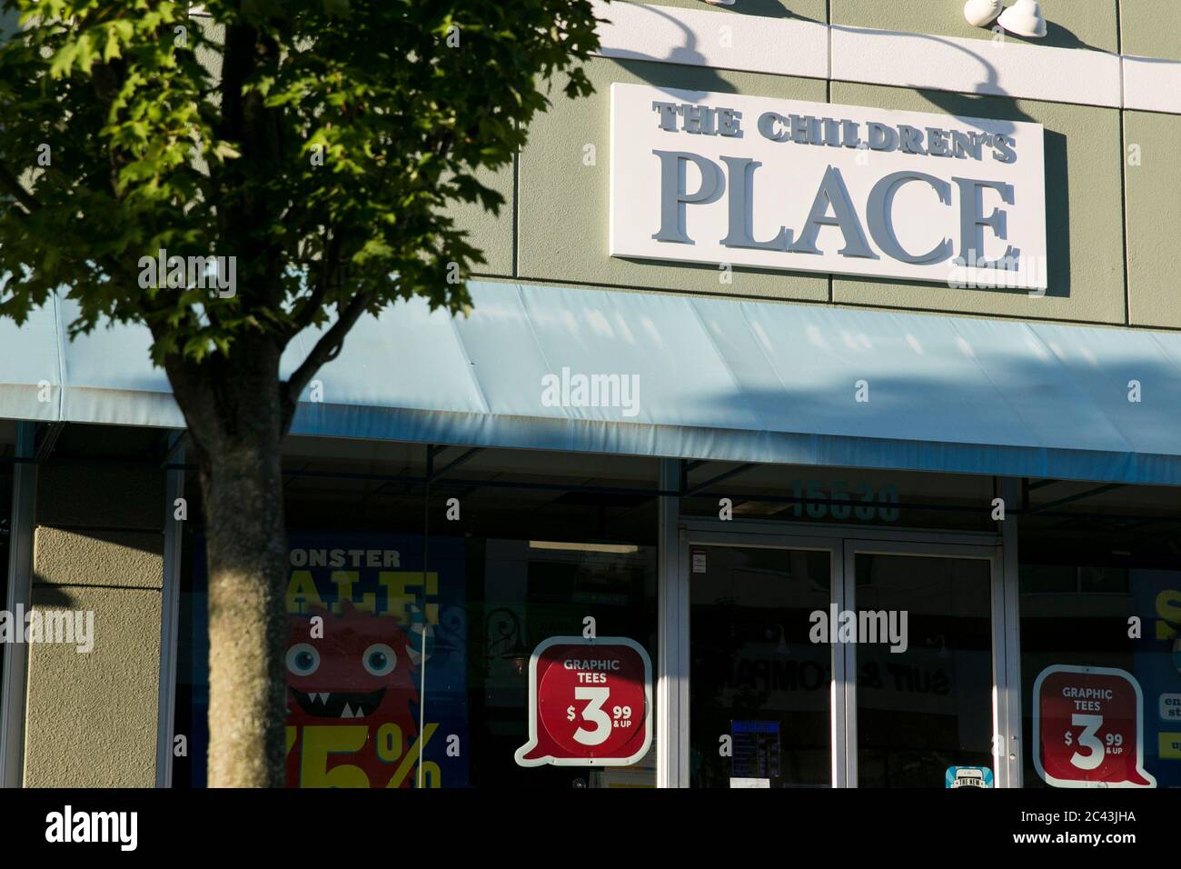 A logo sign outside of a The Children's Place retail store location in