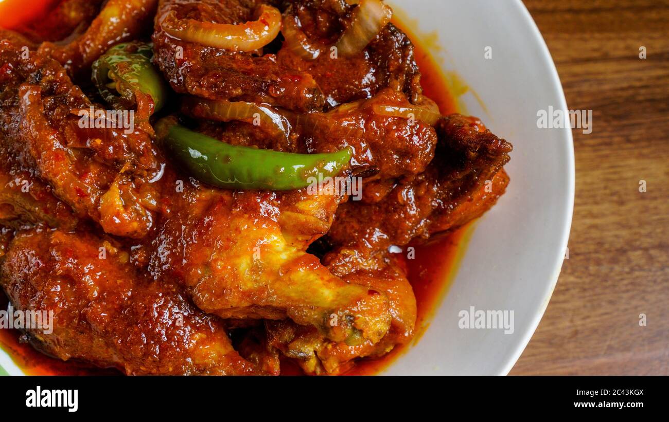 Ayam Masak Merah Is A Malaysian Traditional Dish This Literally Means Chicken Cooked Red In English It Is A Casserole Of Chicken Pieces In Dried C Stock Photo Alamy
