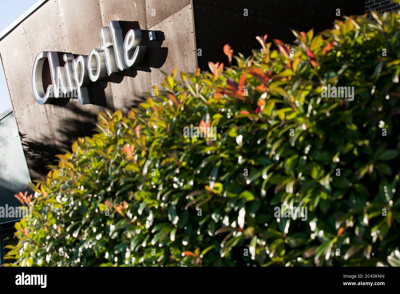 A logo sign outside of a Chipotle restaurant location in Bowie, Maryland on June 8, 2020. Stock Photo