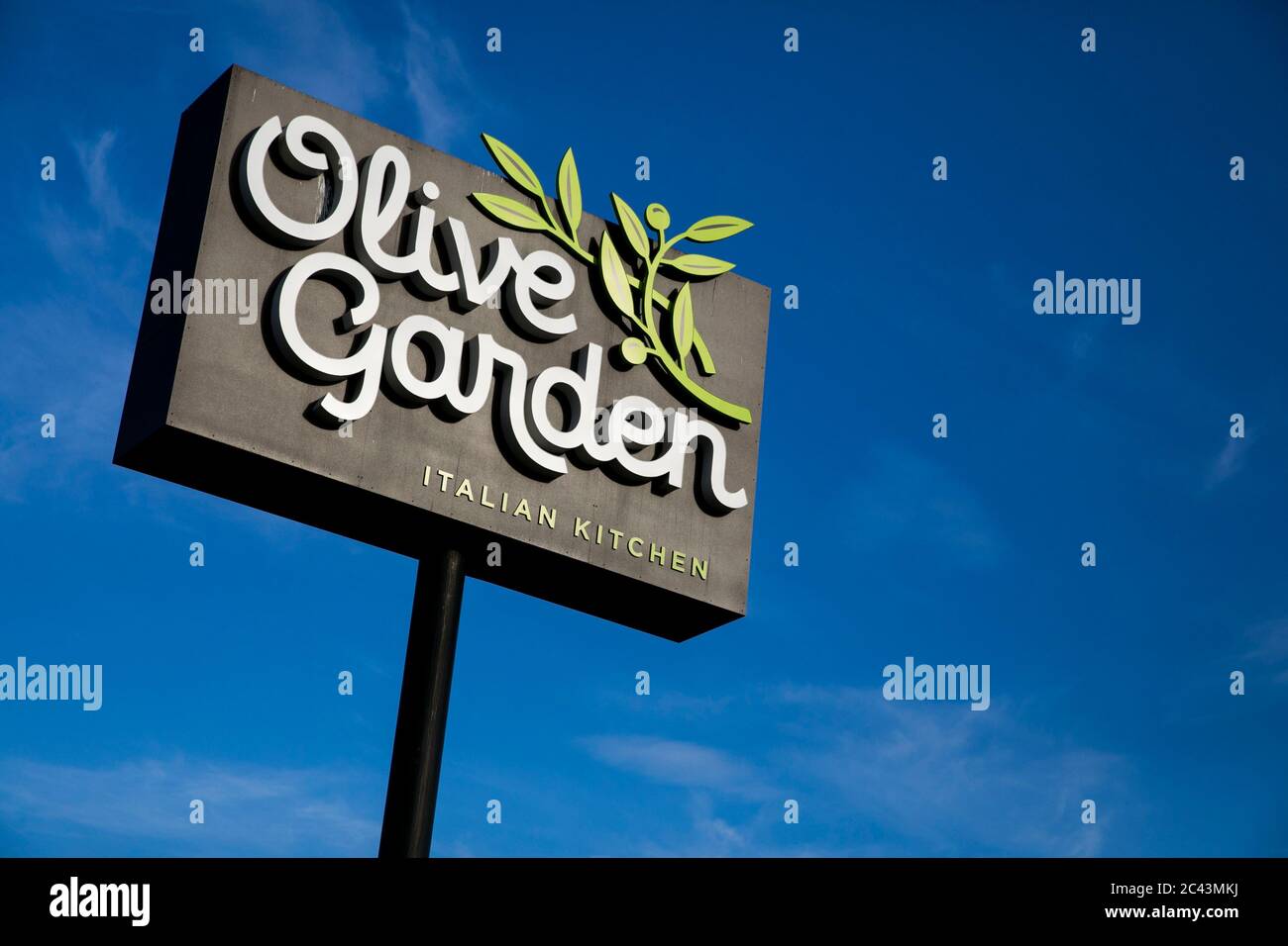 A logo sign outside of a Olive Garden restaurant location in Hagerstown, Maryland on June 10, 2020. Stock Photo