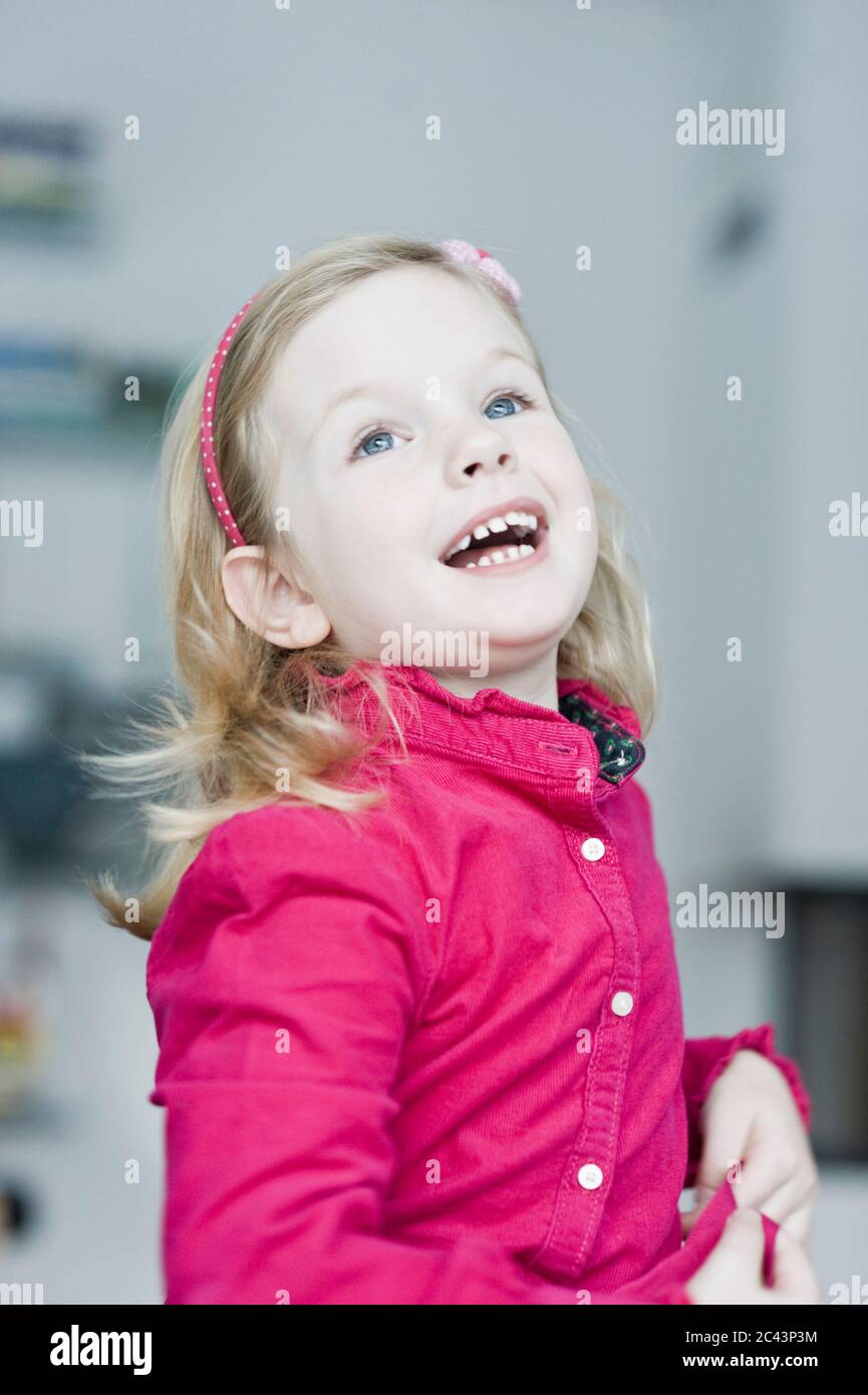Blonde girl laughing hi-res stock photography and images - Alamy