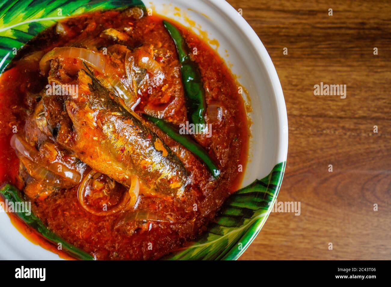 Sambal tumis sardin Sardine fish cooked with spicy sambal Stock Photo