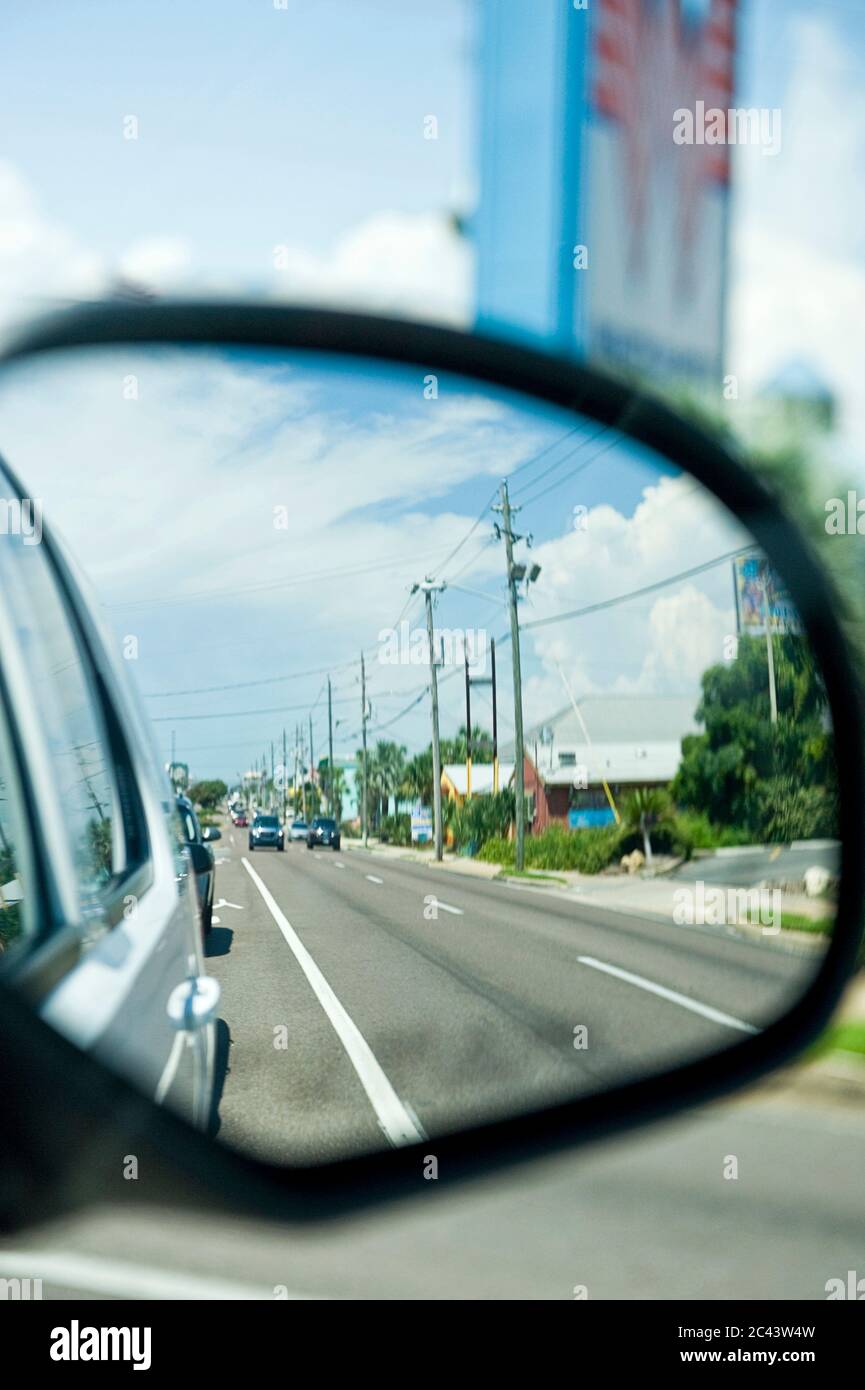 Cars on the street in the rearview mirror, Destin, Florida, USA Stock