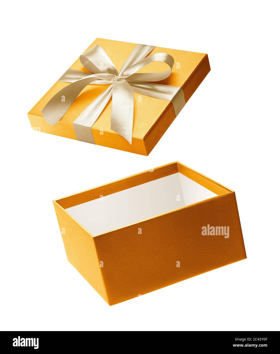 Gold color open gift box isolated on white background Stock Photo