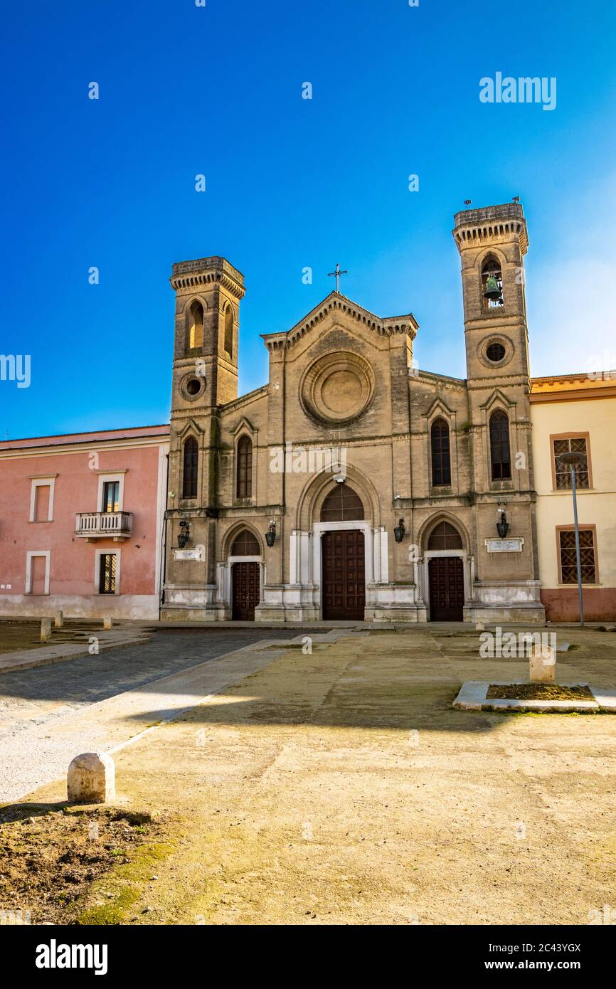 Beautiful and ancient Catholic church of San Domenico, near the plain of grain pits, Piano delle Fosse Granarie. Ancient stone silos for cereal storag Stock Photo