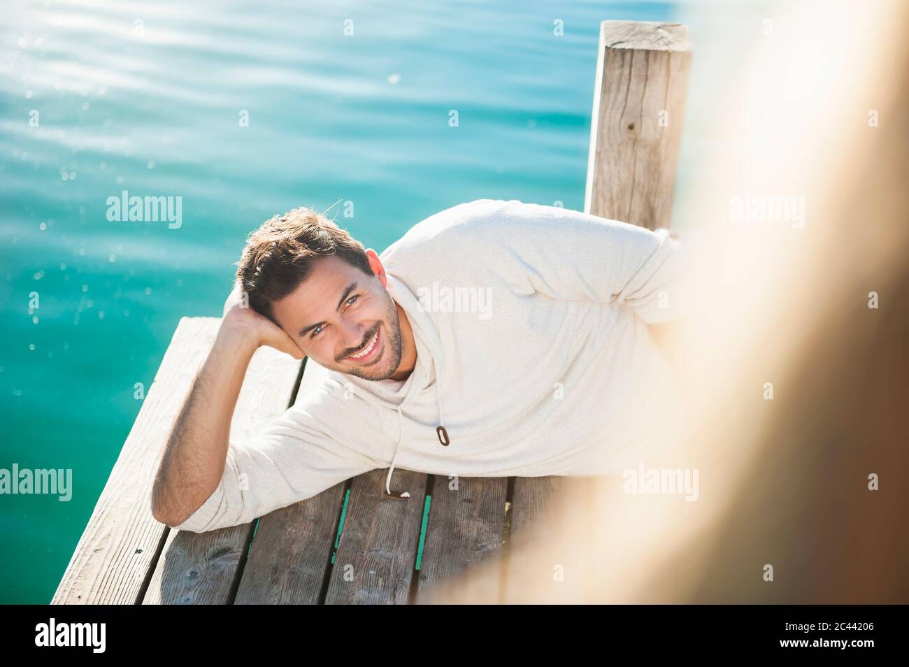 Young woman lying in water hi-res stock photography and images - Alamy