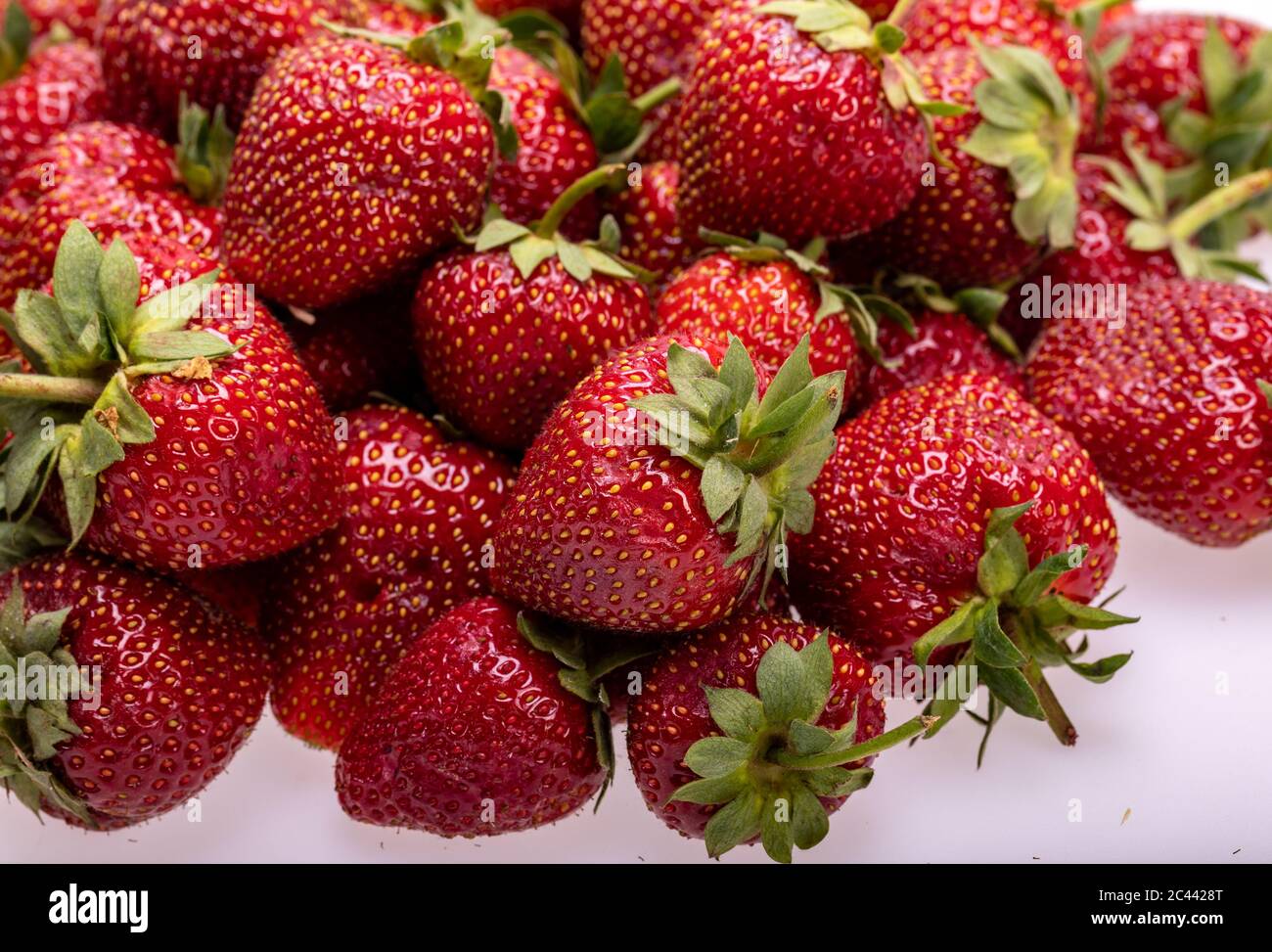 fresh ripe strawberries isolated on white background Stock Photo - Alamy