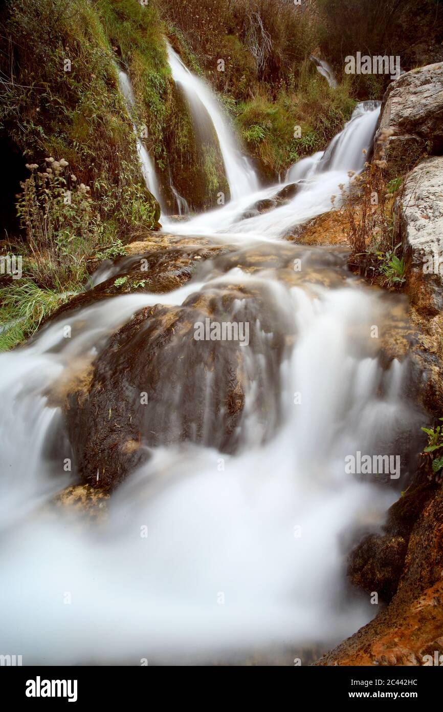 Spain, Province of Guadalajara, Long exposure of waterfall in Alto Tajo Nature Reserve Stock Photo