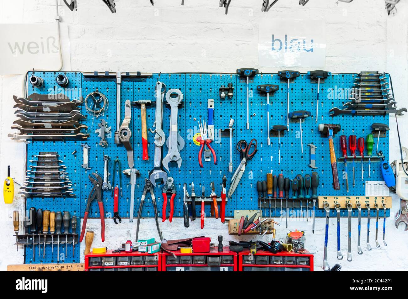 Bicycle shop, wall with various tools Stock Photo Alamy