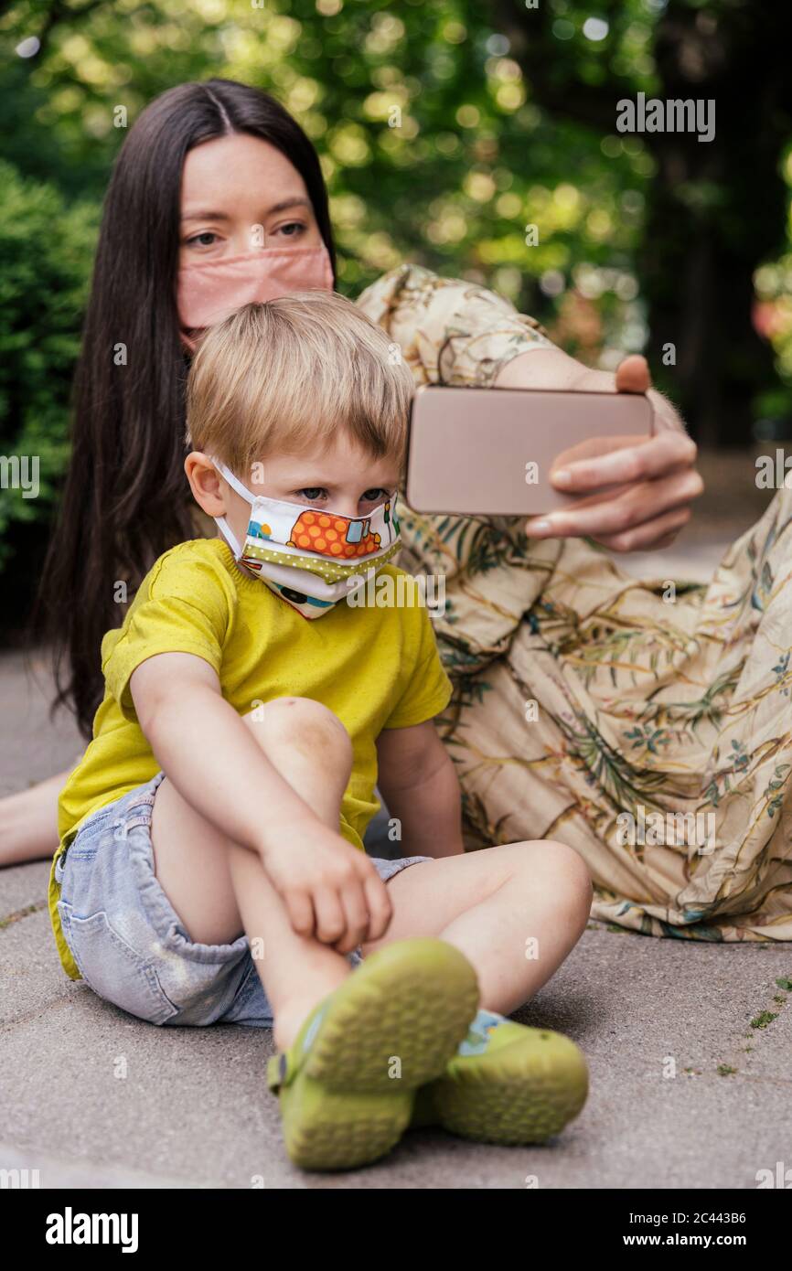 Mother son wearing masks hi-res stock photography and images - Alamy