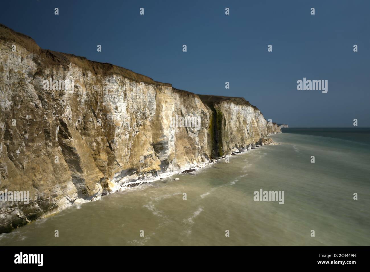 Dramatic chalk cliffs between Peacehaven and Newhaven in East Sussex