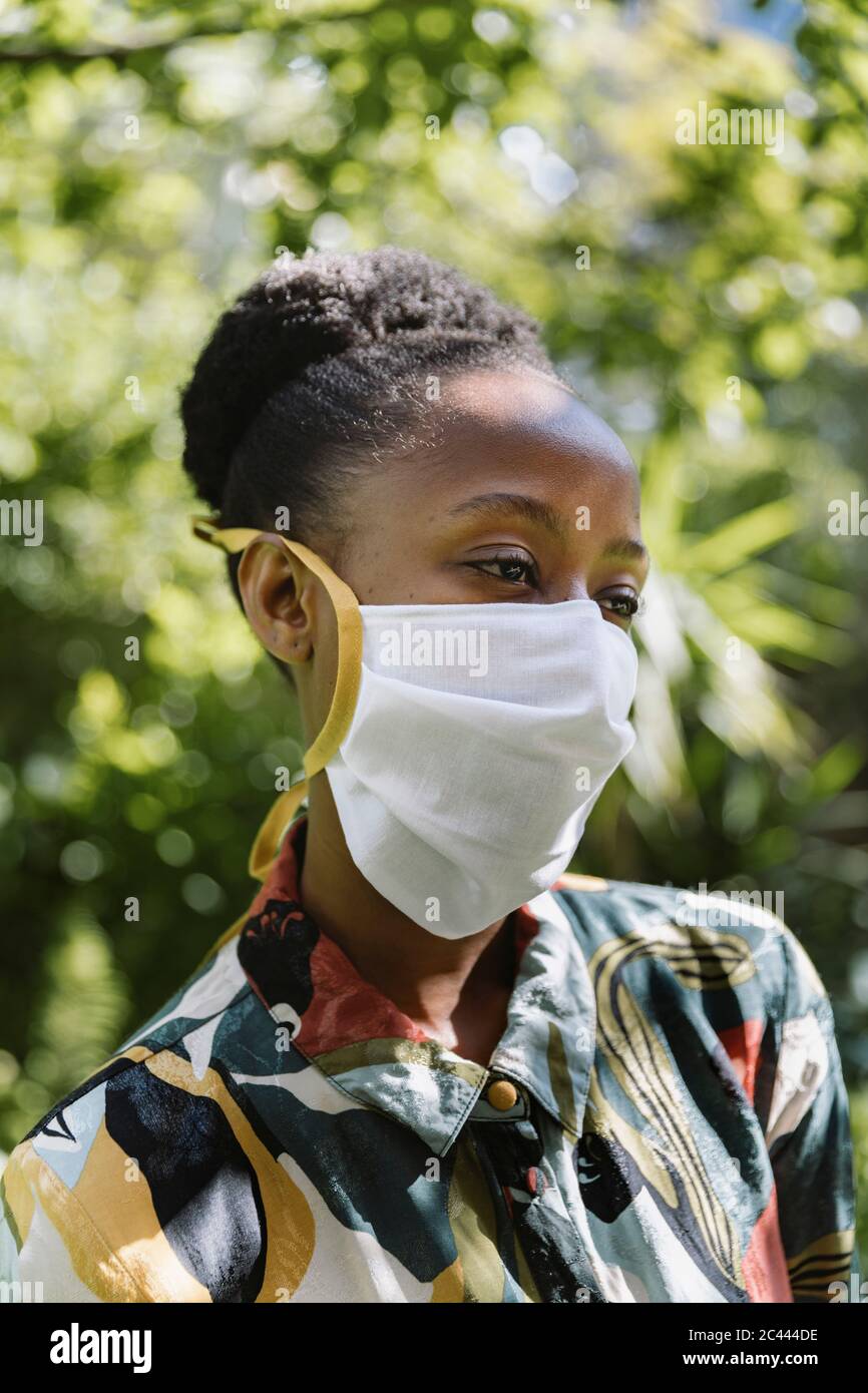 African woman wearing mask hi-res stock photography and images - Alamy