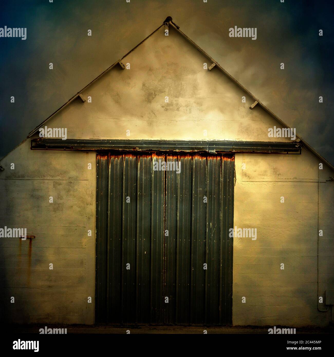 Textured effect on a metal door, Brittany, France Stock Photo