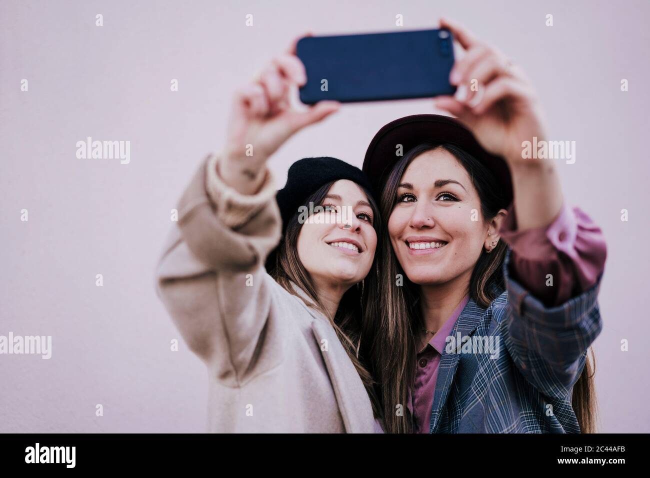 Beautiful women taking selfie smartphone hi-res stock photography and ...