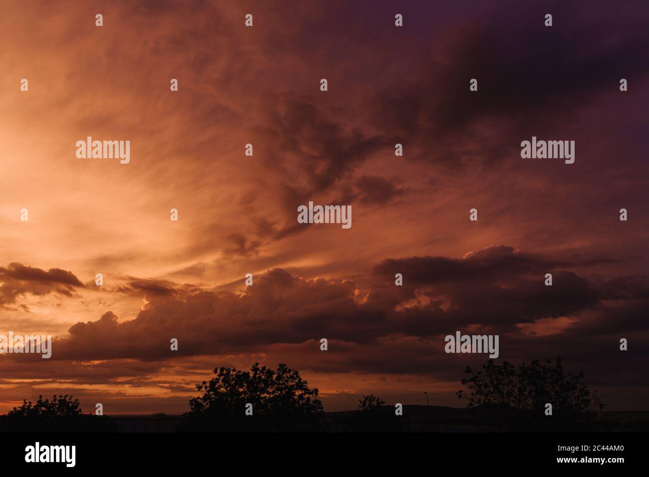 Beautiful sky with orange clouds in sky at sunset . Natural background ...