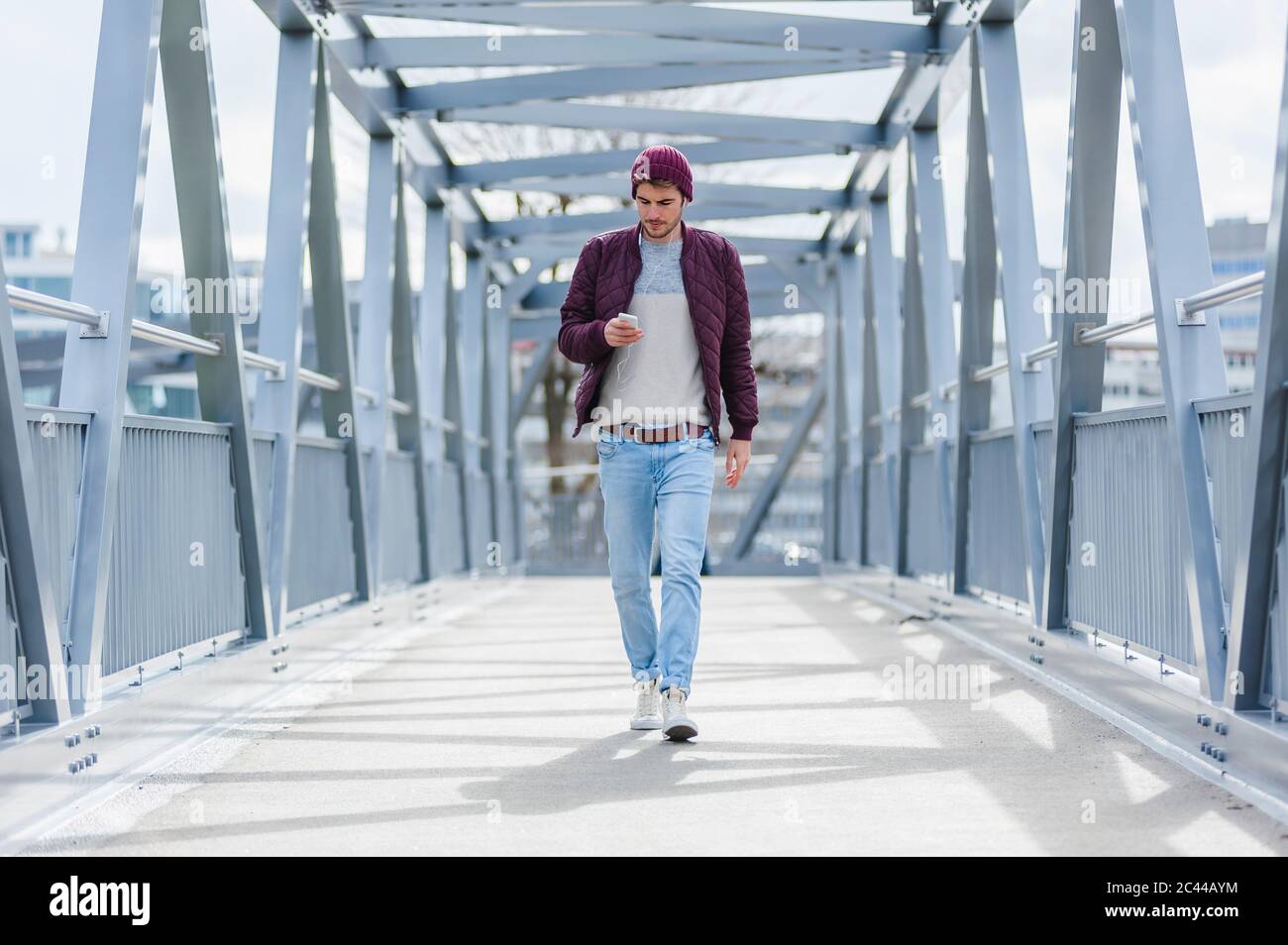 Man walking on a bridge hi-res stock photography and images - Alamy