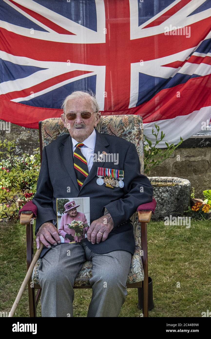 Dunkirk hero's 100th birthday, marked with fly-by over veteran, Eric Taylor Cornish home,HMS Seahawk Band were able to play happy birthday for him. Stock Photo