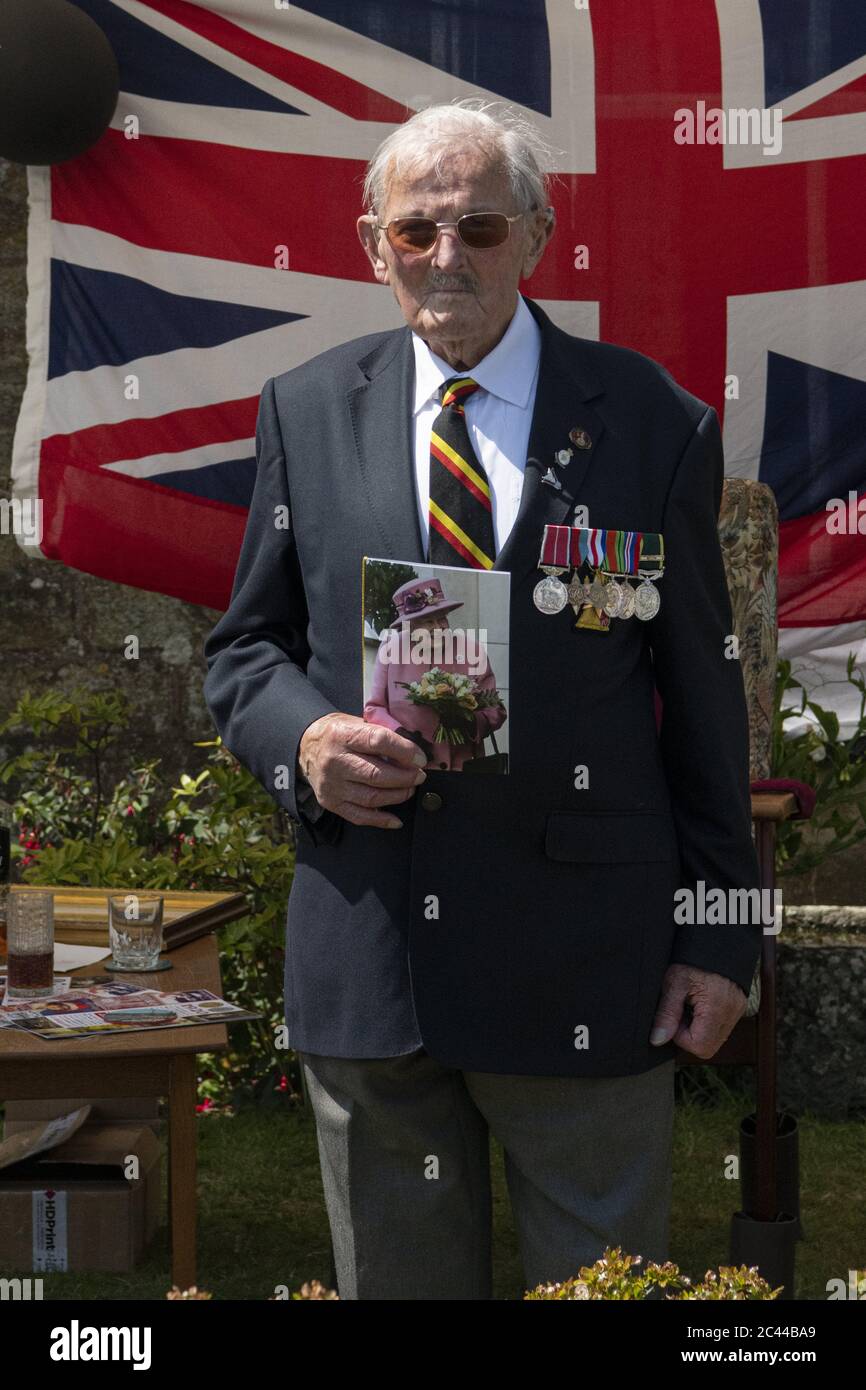 Dunkirk hero's 100th birthday, marked with fly-by over veteran, Eric Taylor Cornish home,HMS Seahawk Band were able to play happy birthday for him. Stock Photo