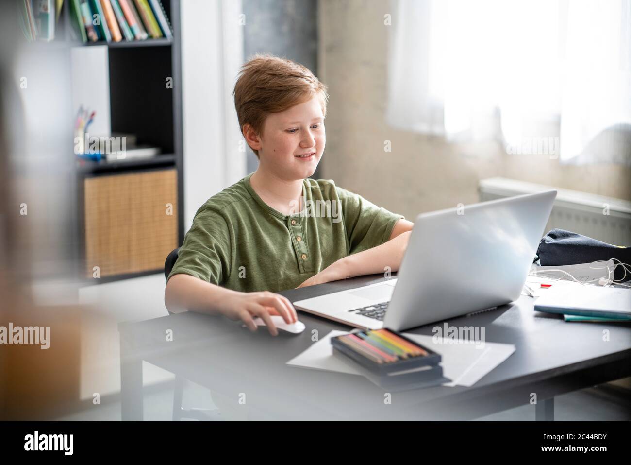 Boy learning at lapop for homeschooling Stock Photo