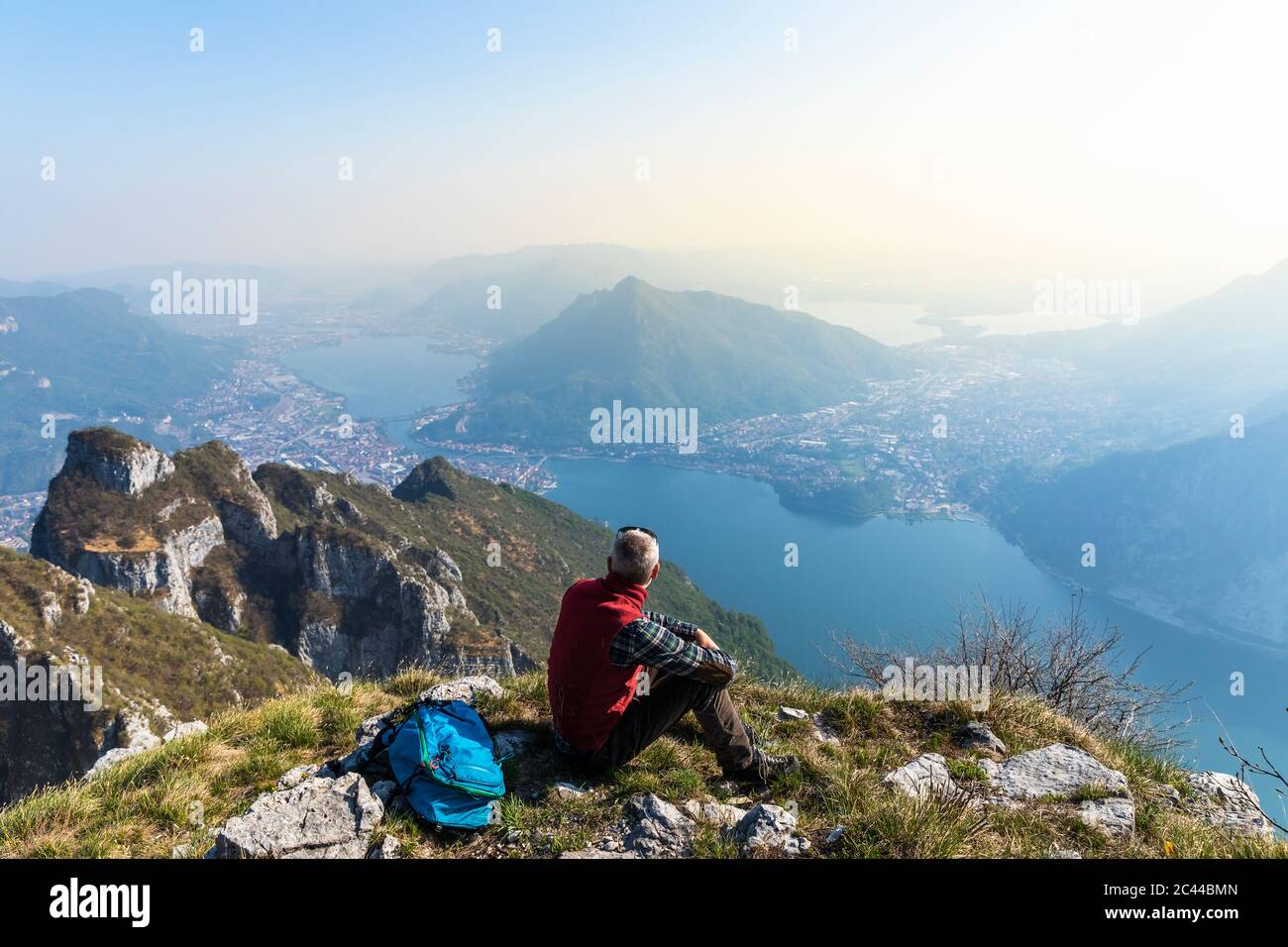 Rear view hiker on mountaintop hi-res stock photography and images - Alamy