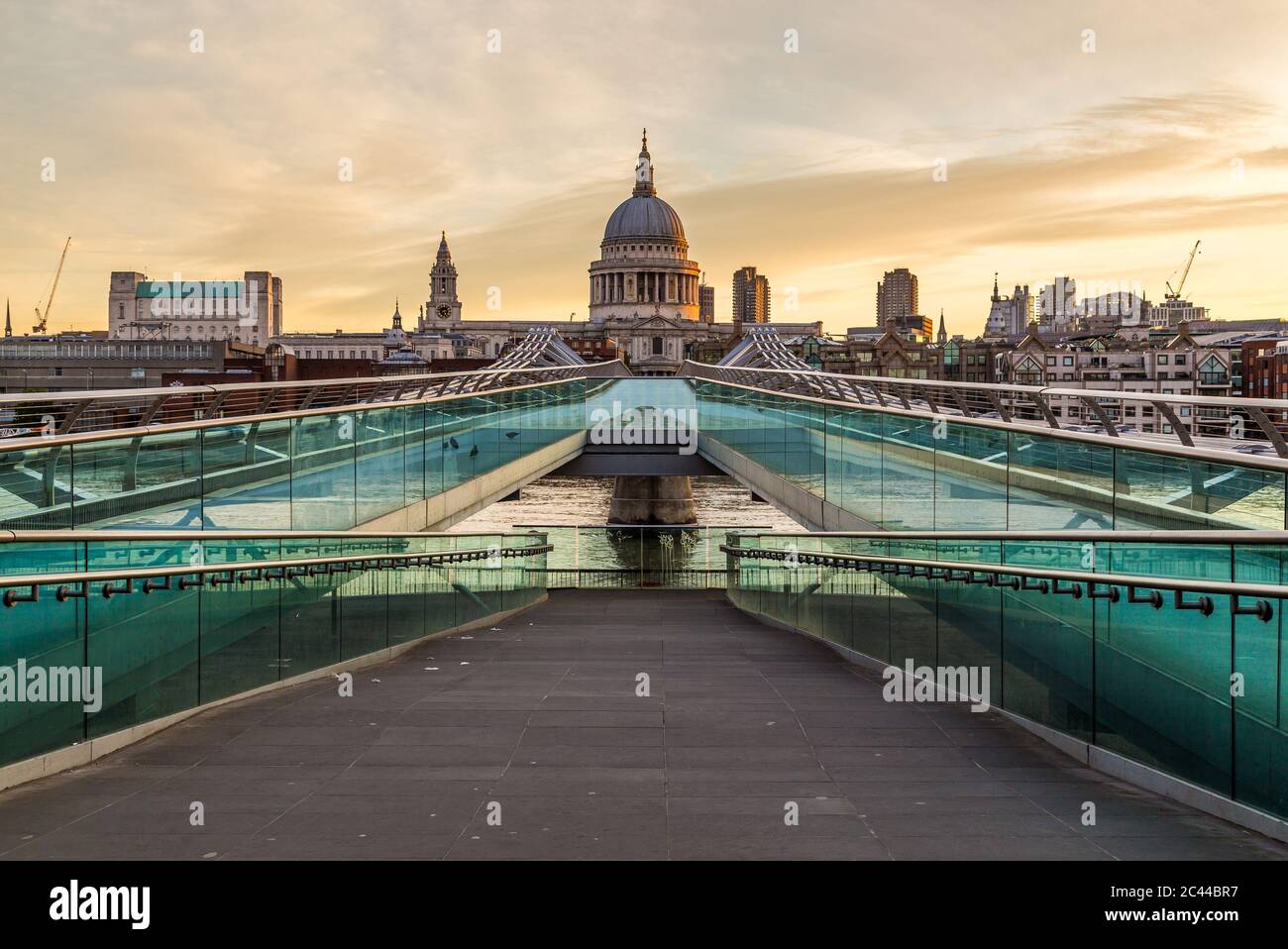 LONDON, UK - 6TH JULY 2016:  A view towards St Pauls Cathedral and Millenium Bridge in the morning. Stock Photo