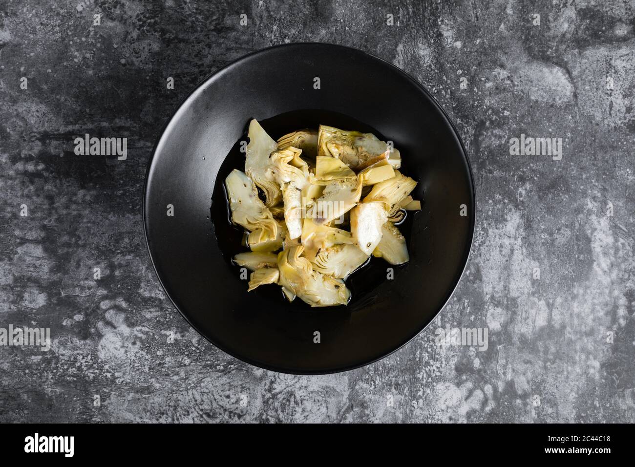 Artichokes in extra virgin olive oil Stock Photo Alamy