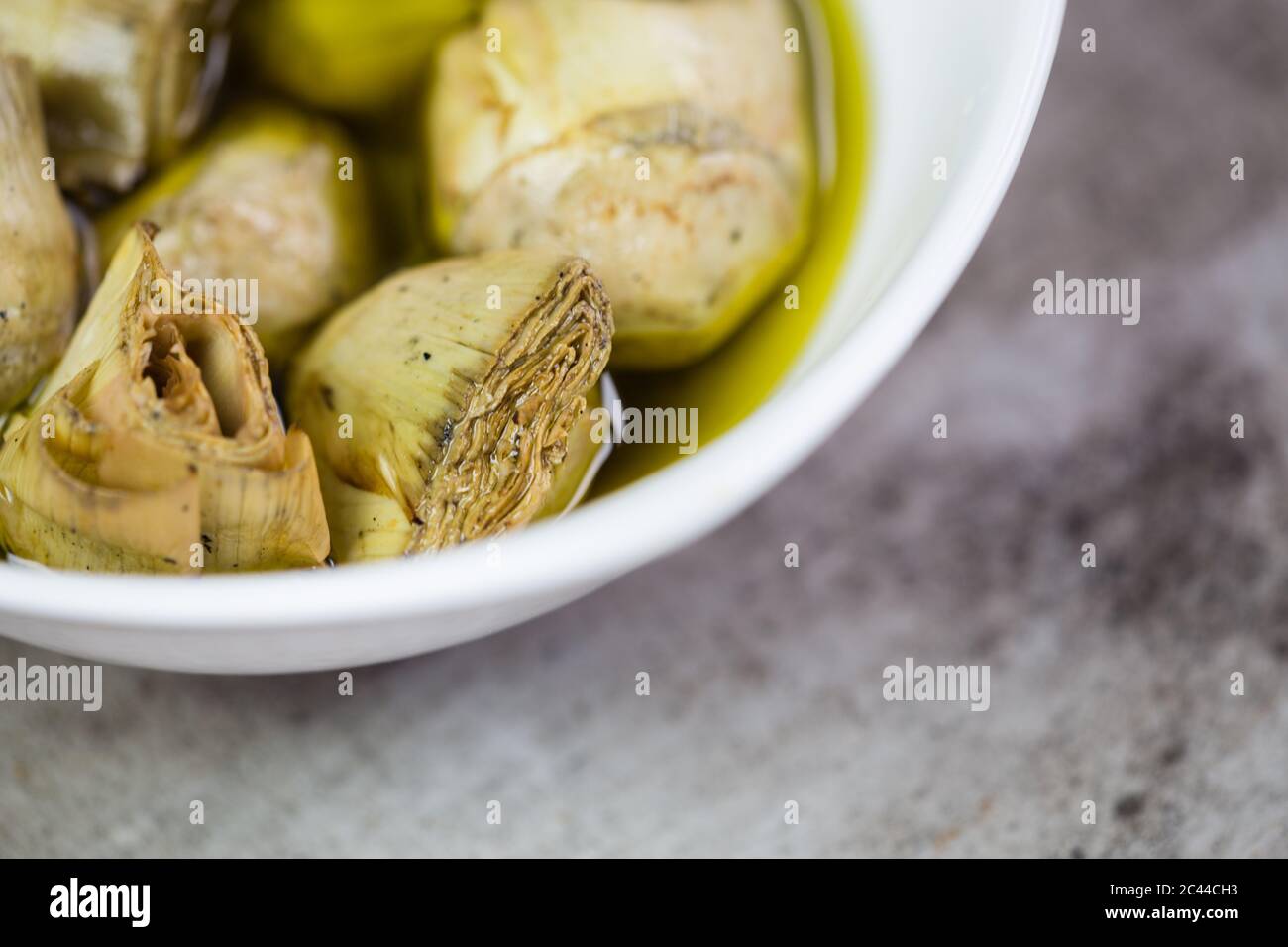 Artichokes in extra virgin olive oil Stock Photo Alamy