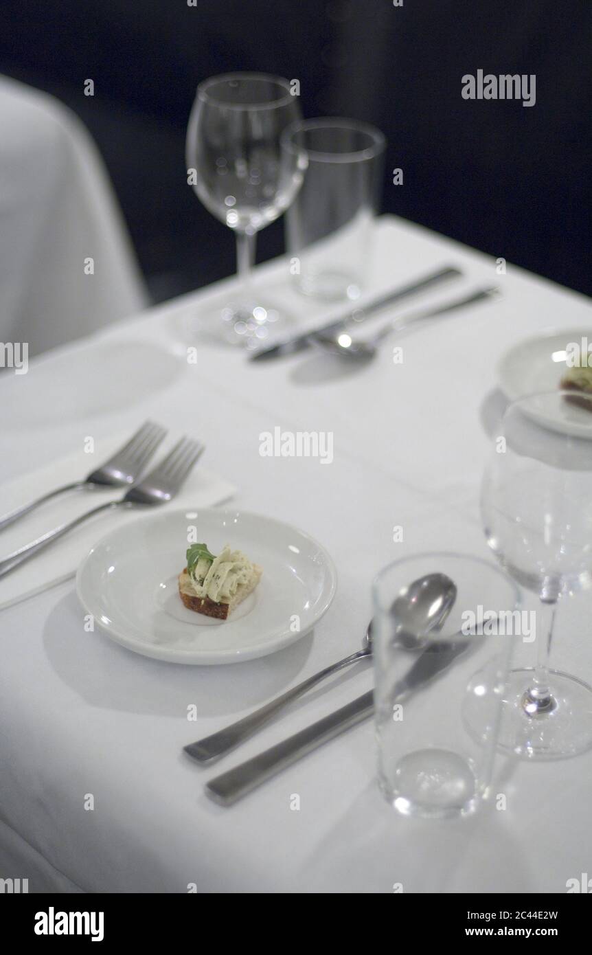 Laid table in the restaurant Stock Photo - Alamy