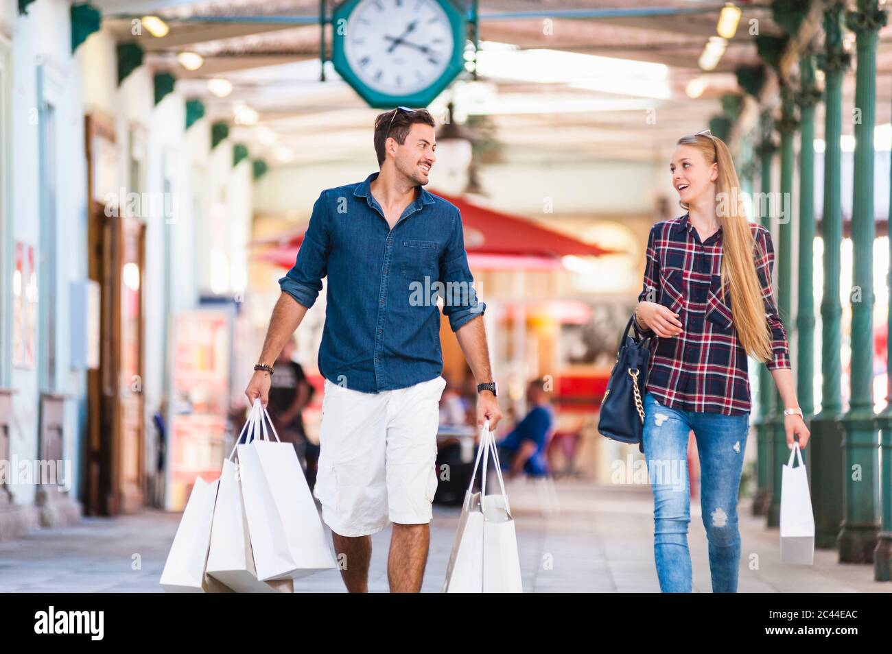 Young couple on a shopping spree Stock Photo