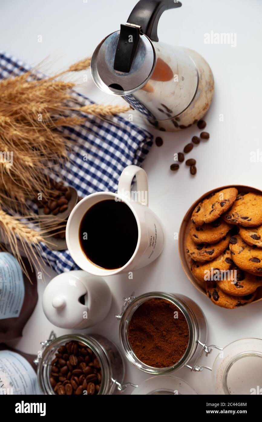 Still life with a coffee maker and cookies. Breakfast top view. Coffee ...