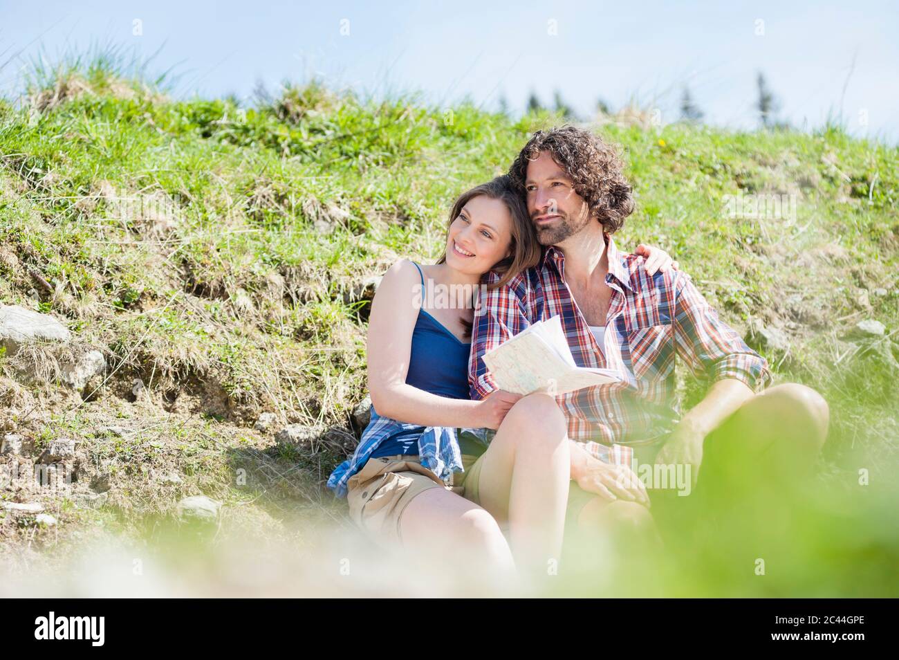 Hiking couple during break map hi-res stock photography and images - Alamy