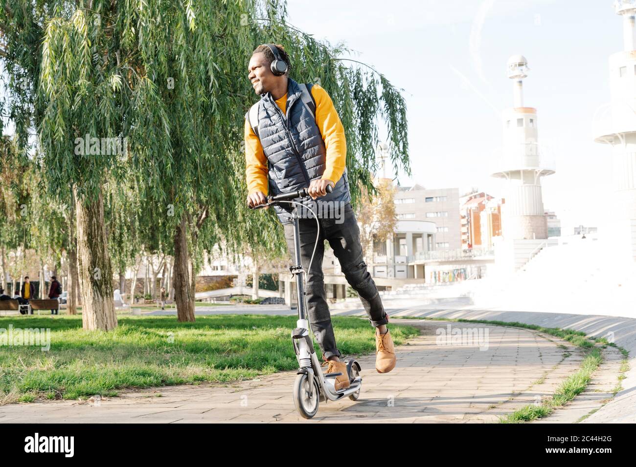 A man riding an e scooter hi-res stock photography and images - Alamy
