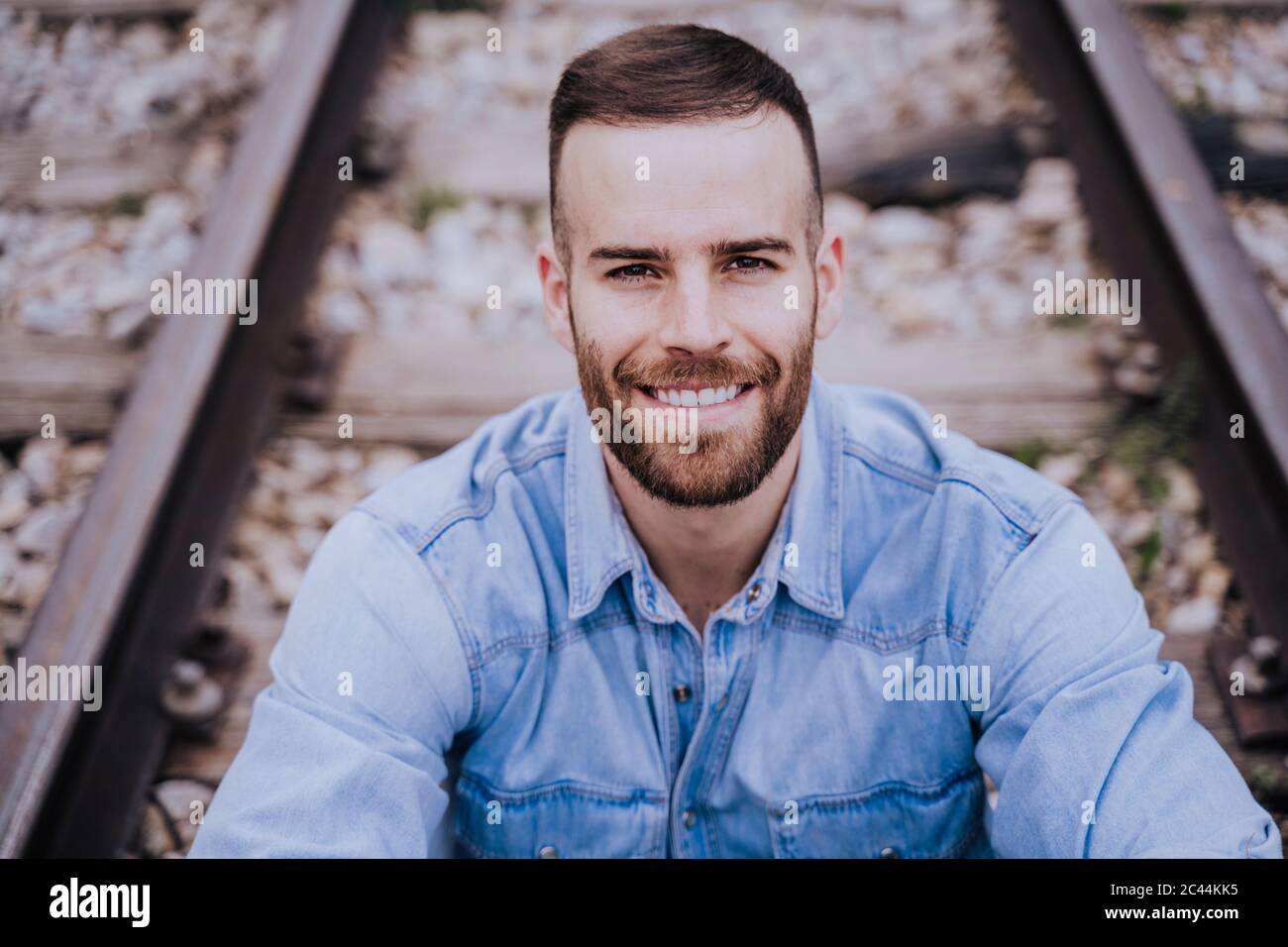 Young man beard smile hi-res stock photography and images - Alamy
