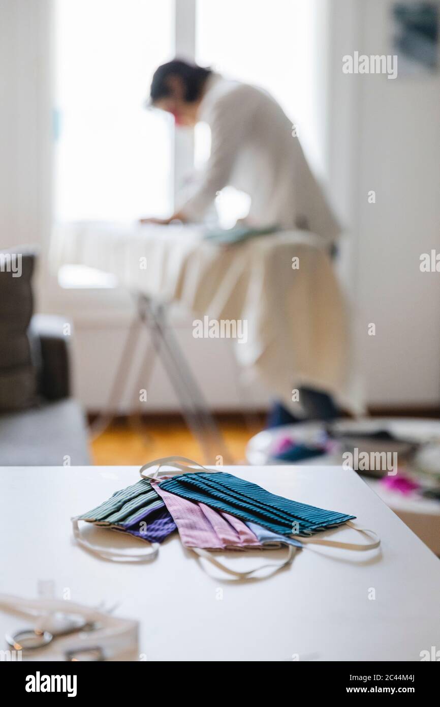 Woman in protective masks hi-res stock photography and images - Alamy