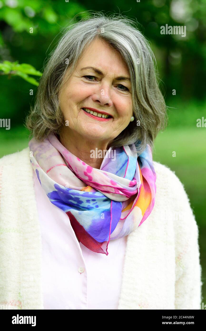 Happy senior woman park hi-res stock photography and images - Alamy