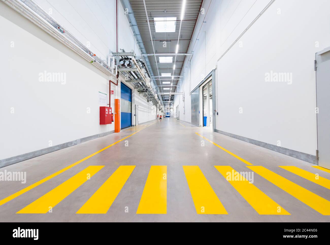 Long corridor in empty factory Stock Photo
