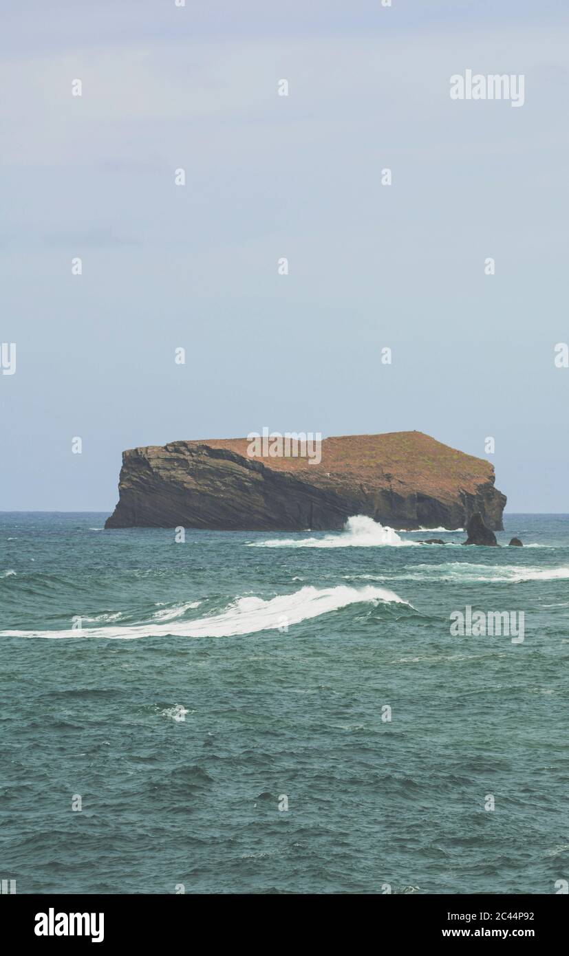 Rock island in the Atlantic Sea, Ponta da Ferraria, Sao Miguel Island, Azores, Portugal Stock Photo