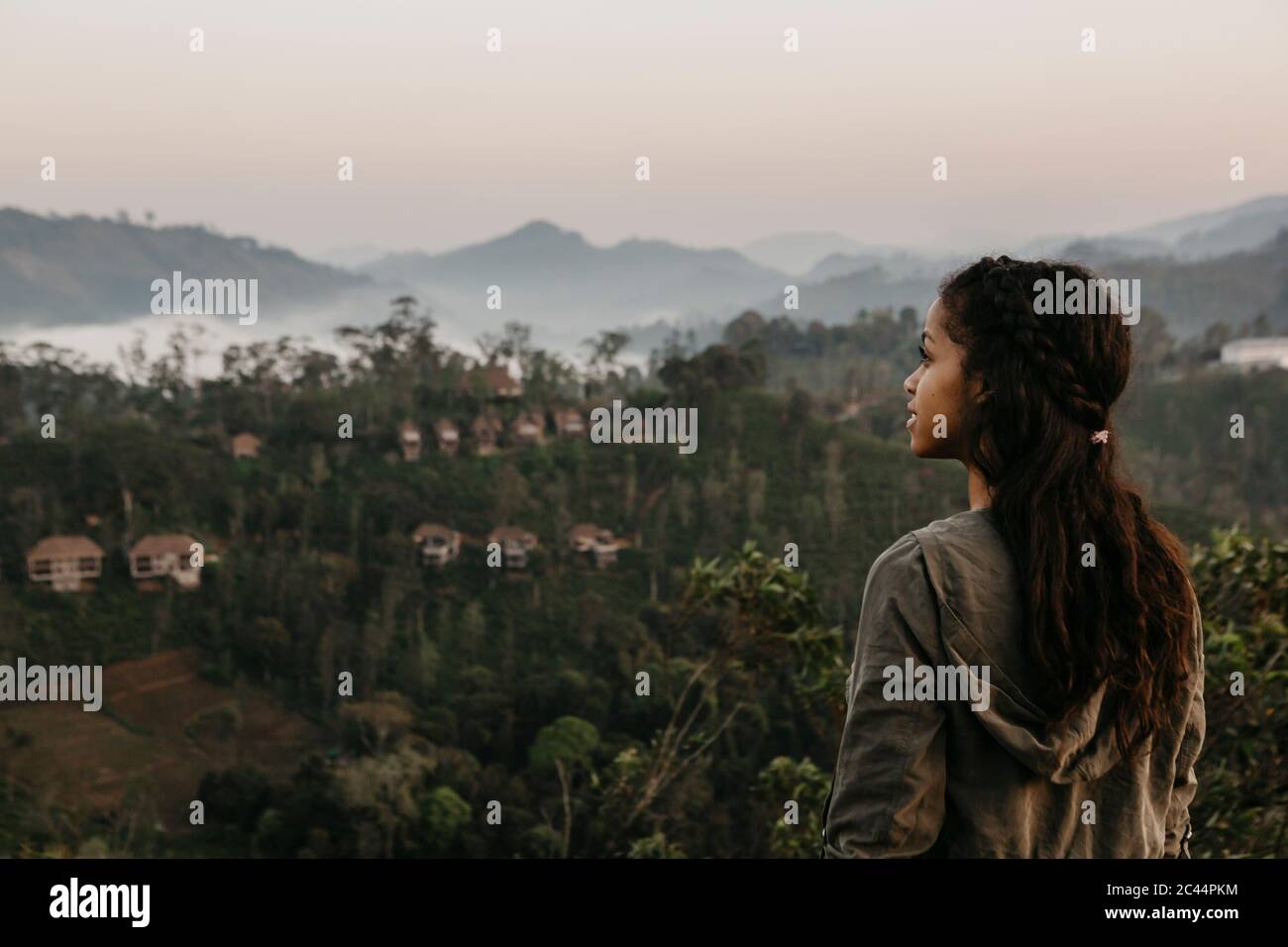Woman looking up sky rear hi-res stock photography and images - Alamy