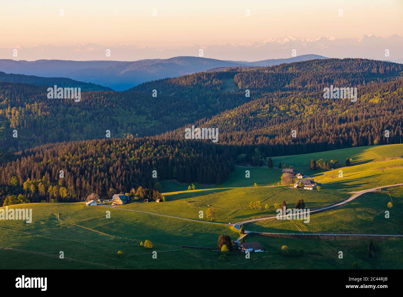 Germany, Baden-Wurttemberg, Hofsgrund, Mountain village at dawn with forest in background Stock Photo
