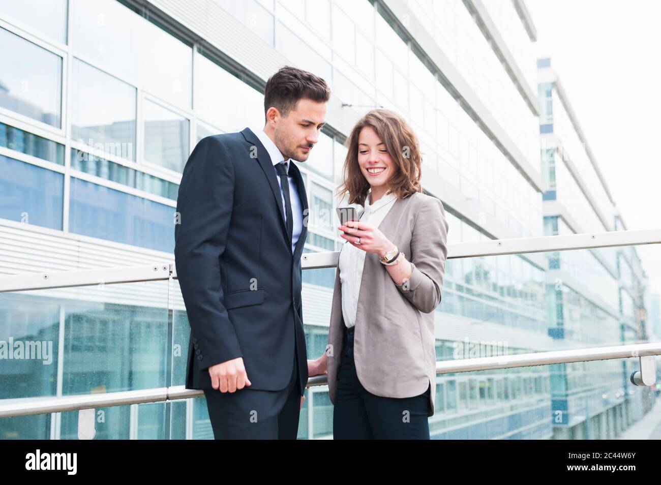 Couple standing outside office hi-res stock photography and images - Alamy