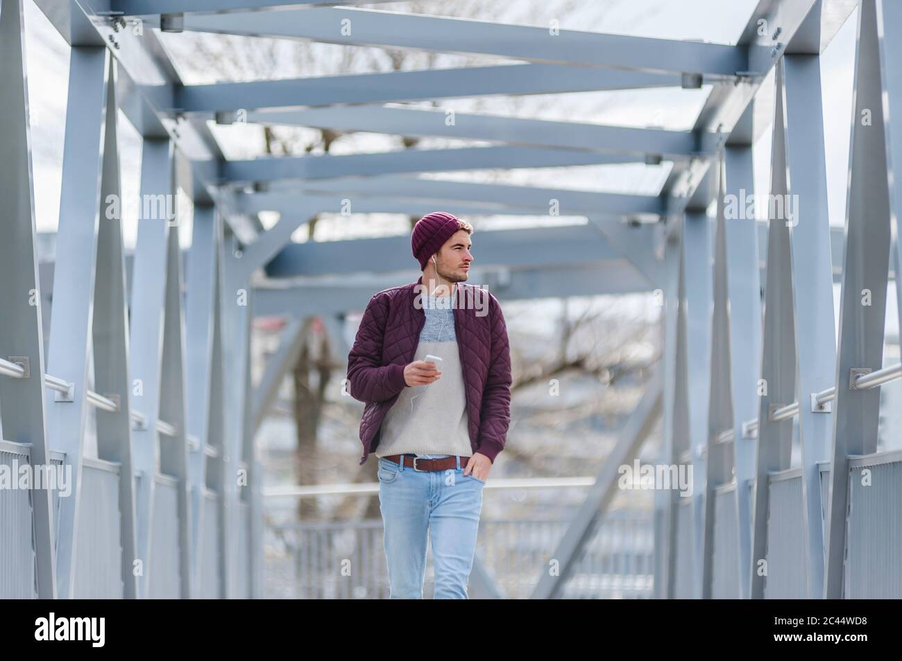 Man walking on a bridge hi-res stock photography and images - Alamy