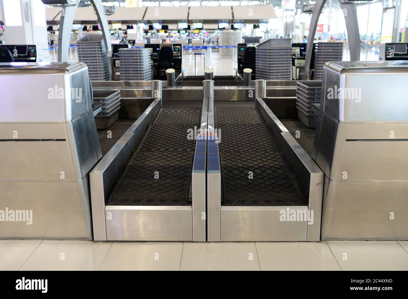 Front view of checkin area with baggage handling belt conveyor in
