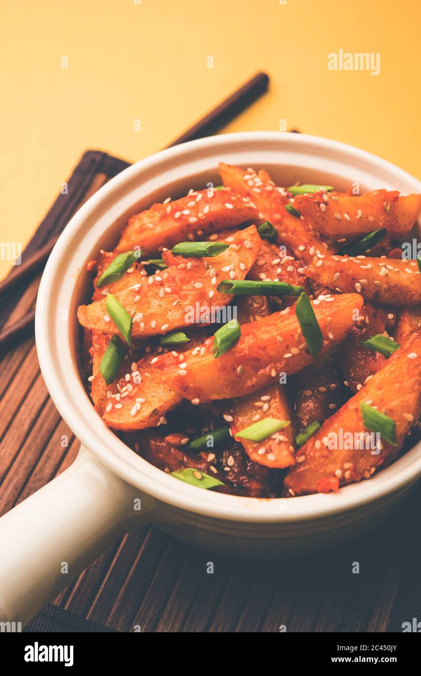 Honey Chilli Potato is a popular Indian Chinese food Stock Photo - Alamy