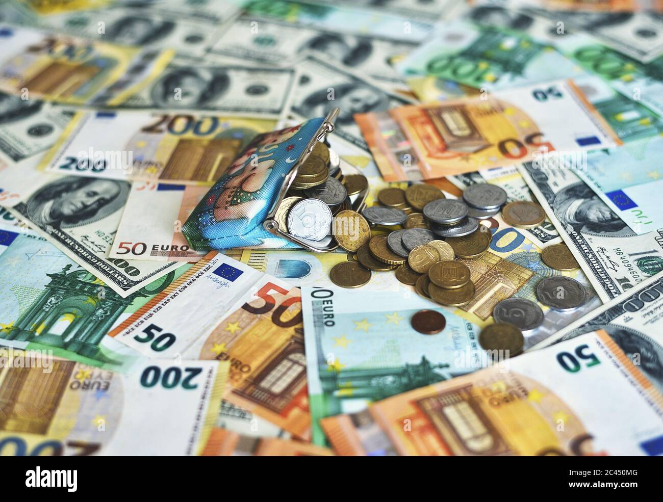 coins fall from the wallet to the table Stock Photo