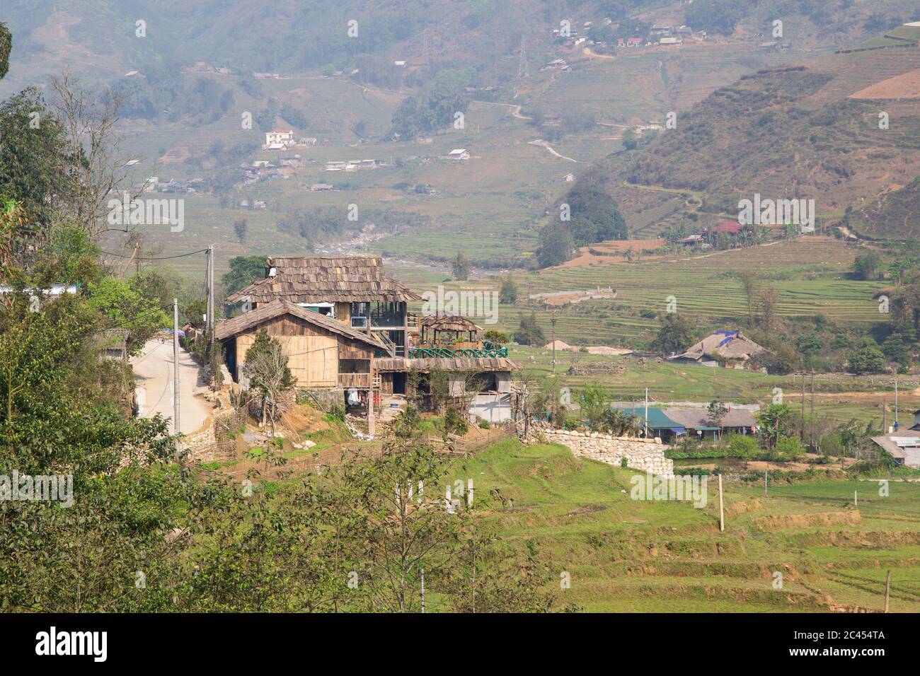 SAPA, VIETNAM - 23RD MARCH 2017: Buildings, huts and landscapes in Sapa Vietnam. Buildings designed like this are common in this region. Stock Photo