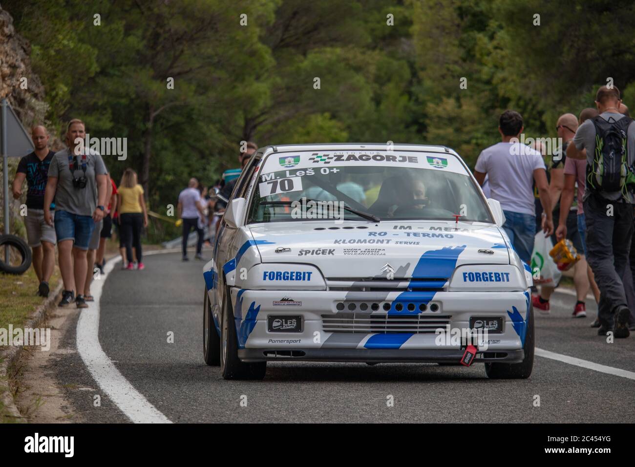 Skradin Croatia, June 2020 Blue and white Citroen AX GT descending from the hill after a hill climb race Stock Photo