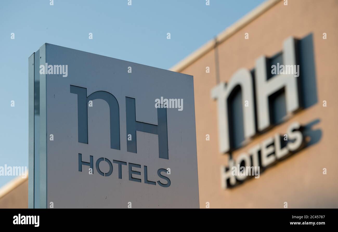 23 June 2020, Bavaria, Aschheim Bei München: The logo of the hotel chain NH-Hotels can be seen on a hotel. Photo: Tobias Hase/dpa Stock Photo