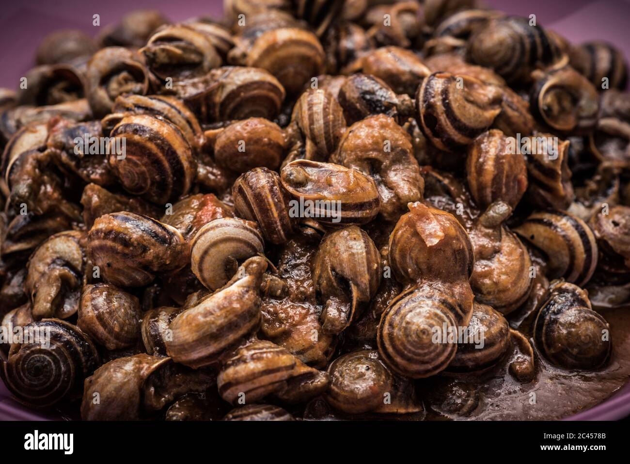 Escargo Shot Snail escargot in sauce hi-res stock photography and images - Alamy